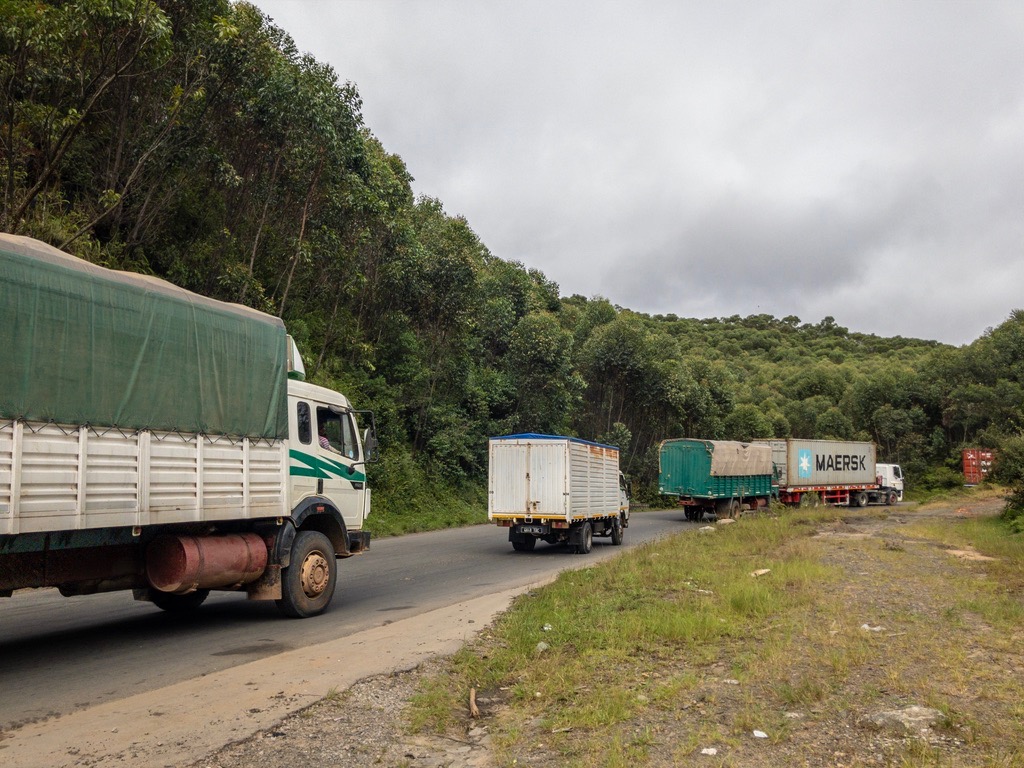 Convoy of trucks - most of them carry containers from Tamatave to Tana