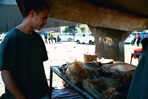 At one of the stands, you could choose among kidney, liver, heart and other meats. I picked heart, one of the guys cut it and grilled it.