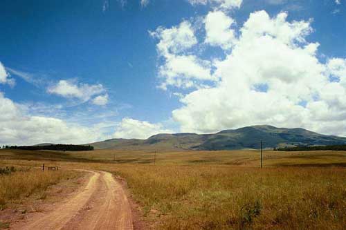 Swaziland is a monarchy, almost completely surrounded but independent of South Africa. People are very friendly. Children would wave when we drove down the road.